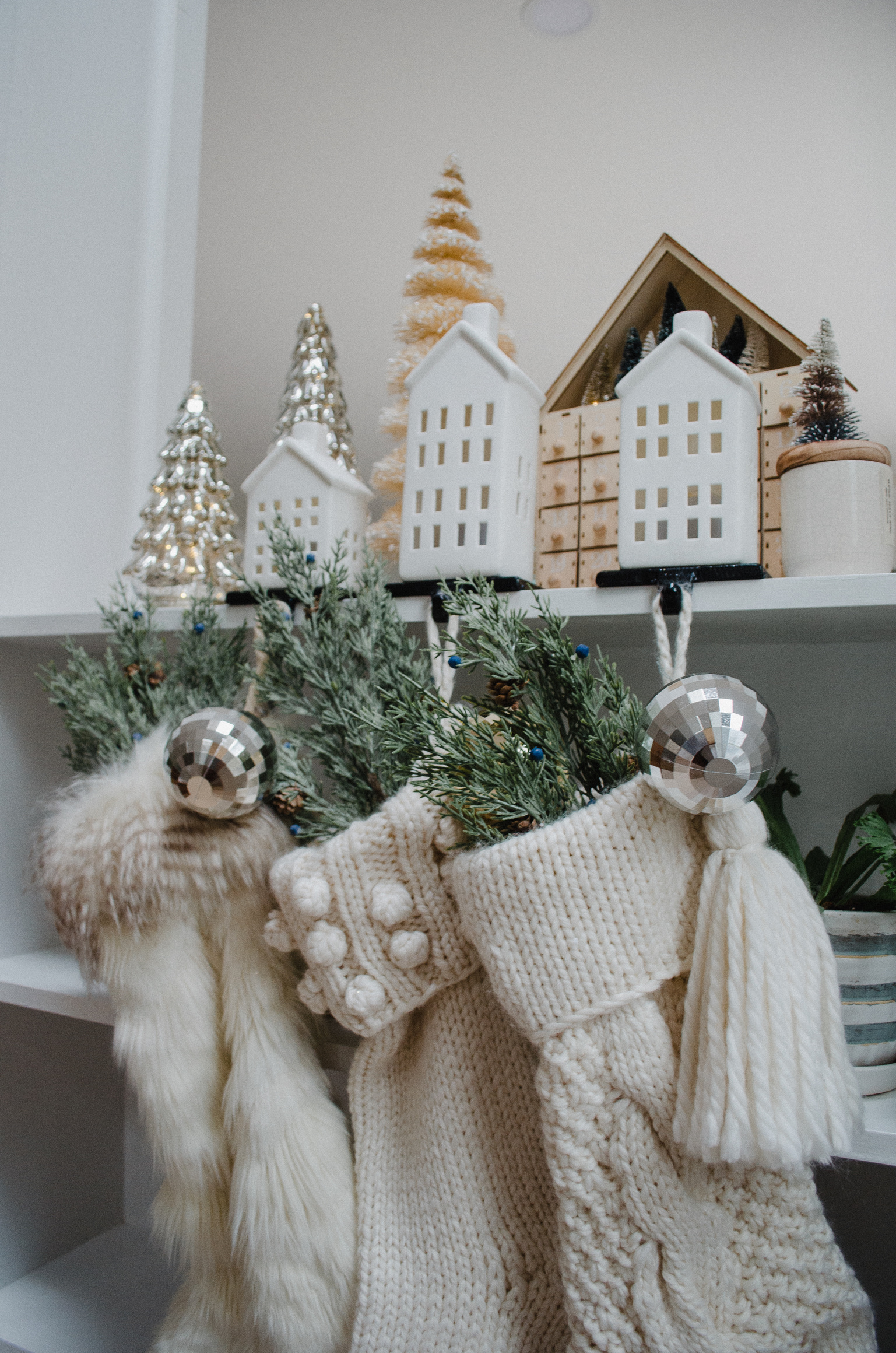 Connecticut life and style blogger Lauren McBride shares how to hang stockings without a mantle for the holidays.