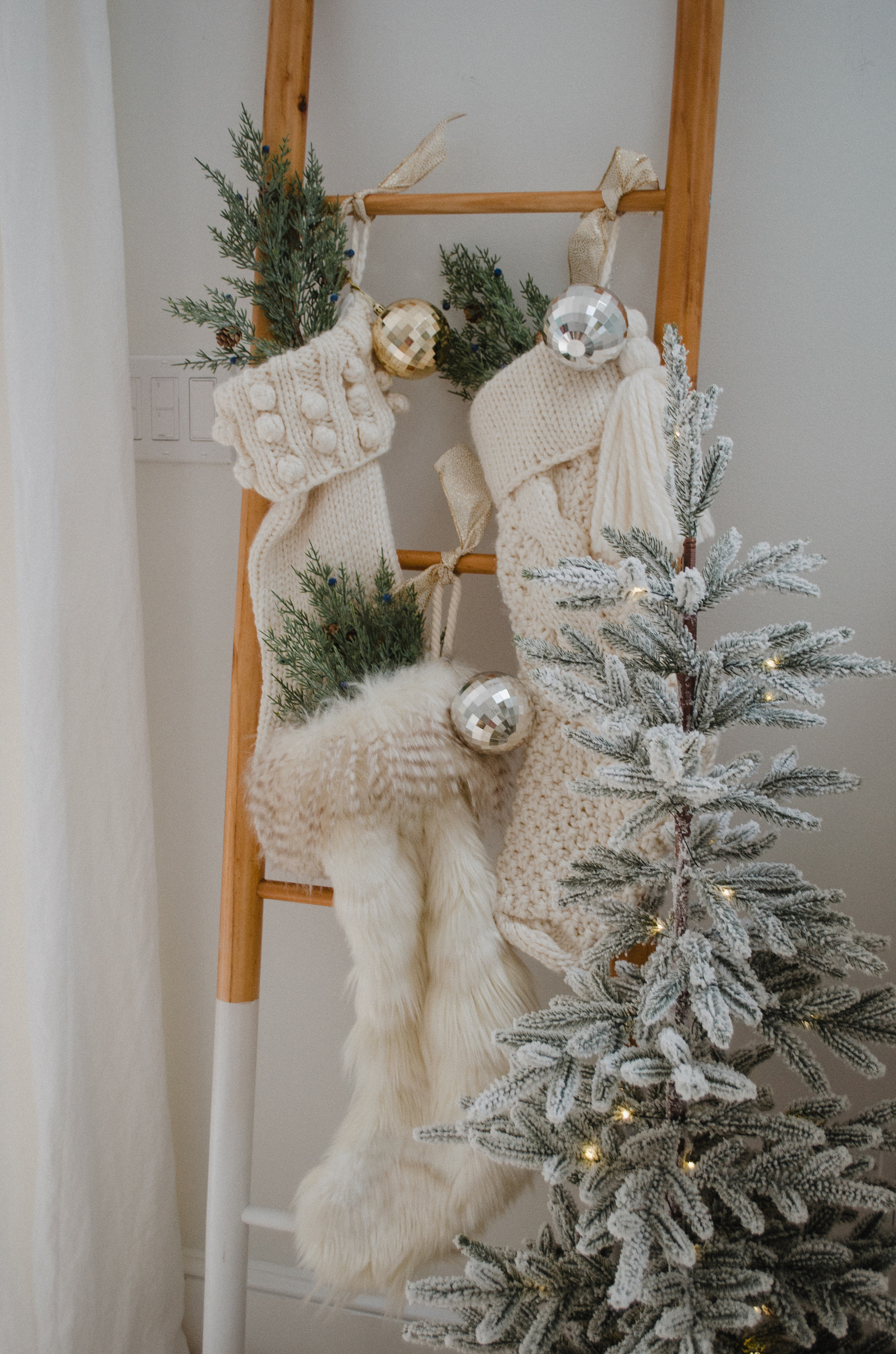 Connecticut life and style blogger Lauren McBride shares how to hang stockings without a mantle for the holidays.