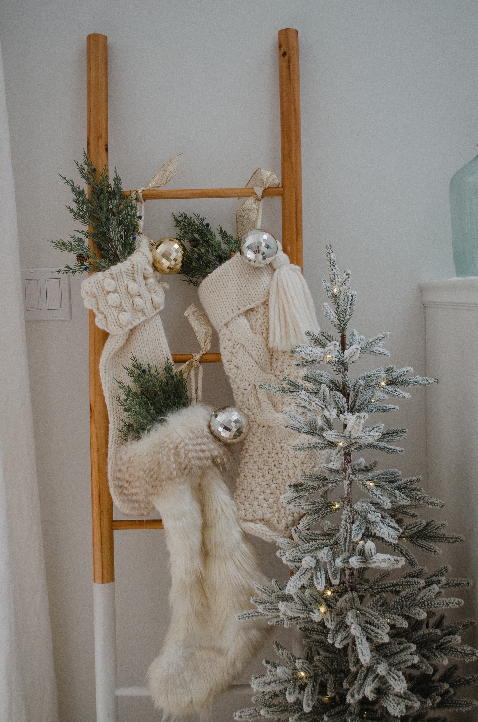 Connecticut life and style blogger Lauren McBride shares how to hang stockings without a mantle for the holidays.